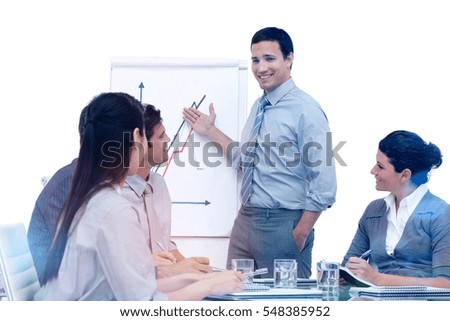 Young businessman presenting statistics in a company