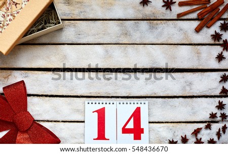 Festive red bow, gift box, smartphone and kitchen herbs on the white wooden table. Valentines day Holiday and gift concept. picture with free space for text