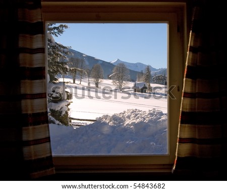Snow landscape view through the window