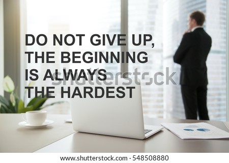 Company president in formal suit standing, looking through window at cityscape, dreaming. Photo with motivational text "Do not give up, the beginning is always the hardest". Business success concept