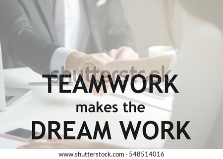 Closeup of male and female hands handshaking. Photo with motivational text "Teamwork makes the dream work" Business, meeting concept