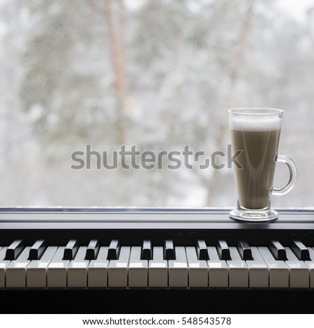 electronic piano in the interior near the window