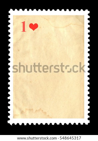 Vintage blank postage stamp and one red heart on a black background. Valentine's Day.