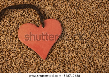 Red heart on cork background
