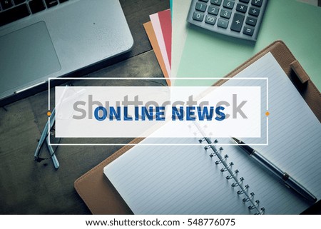 Notebook and Laptop with text ONLINE NEWS