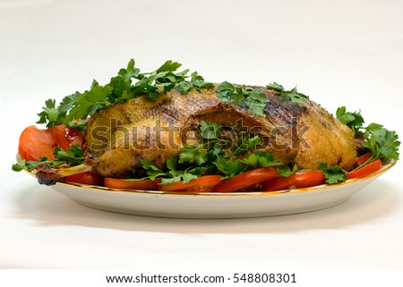 roasted duck festive appetizer with a golden crust close-up