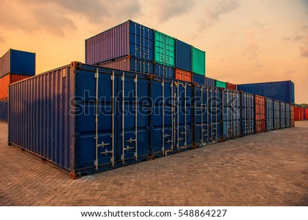 container,container ship in import export and business logistic.By crane , Trade Port , Shipping.Tugboat assisting cargo to harbor.