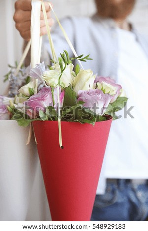 Man holding beautiful bouquets, closeup