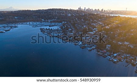 Seattle, Washington, Portage Bay - Aerial Mt Rainier & City Skyline - Magical Sunset Evening - Lens Flare Sunlight Rays