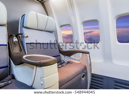 Airplane cabin interior view Royalty-Free Stock Photo #548944045