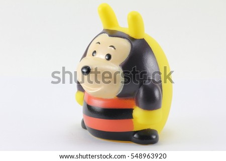 Bee rubber toy on a white background.