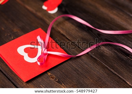 Valentine's day red hearts. Happy Valentine's day red hearts on wooden background