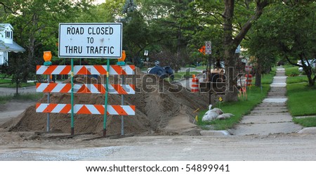 road closed - construction sign, street and sidewalk