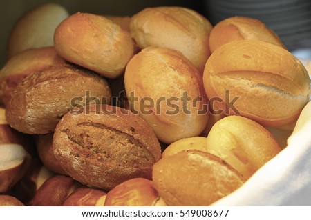 Assorted bread in a basket Royalty-Free Stock Photo #549008677