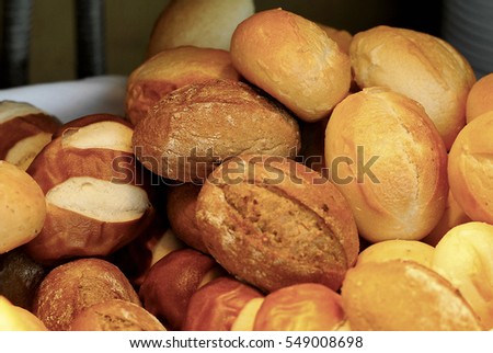 Assorted bread in a basket Royalty-Free Stock Photo #549008698