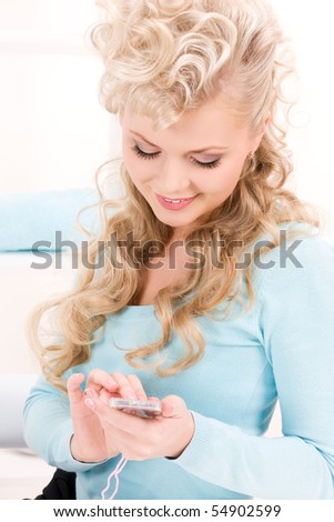 picture of lovely woman with small calculator