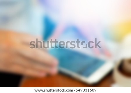 Blurred  background abstract and can be illustration to article of businesswoman use mobile phone