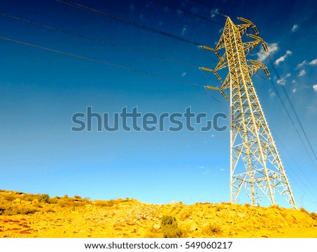 Photo picture of a electricity Pylon tower in the desert