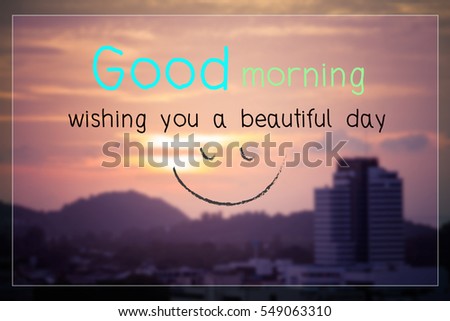 good morning wishing you a beautiful day quote in blurred morning background.