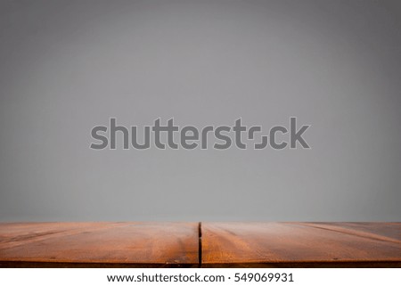 Empty top of wooden table or counter and  wall or  backdrop background.For product display