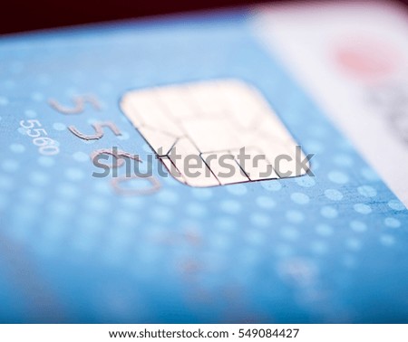 Credit card in close up. Abstract photo of bank card with shallow depth of field