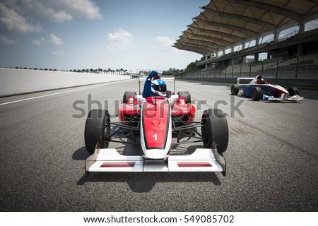 driver celebrate victory pass the finishing point Royalty-Free Stock Photo #549085702