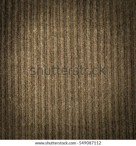 Corduroy background in close up. Texture of corduroy textile - useful as background.