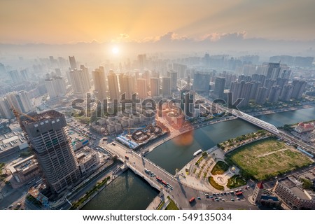 modern city in sunset, aerial view of tianjin cityscape