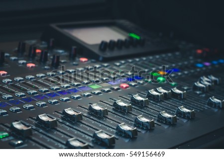 The audio equipment, control panel of digital studio mixer, side view. Close-up, selected focus Royalty-Free Stock Photo #549156469