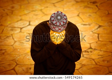 Muslim man praying,Hope,Believe,Faith Royalty-Free Stock Photo #549174265