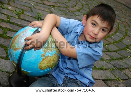 Schoolboy with globe