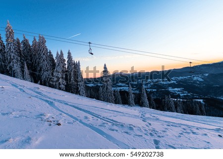 Snow traces at the sunset in carpathian mountains