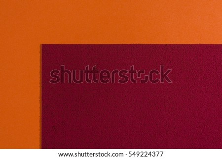 Eva foam ethylene vinyl acetate sponge red surface on orange smooth background