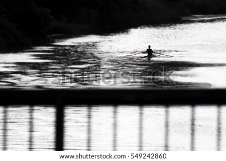 "Man in Canoe"
Photo taken from Ferrara's Darsena bridge. 
Photo was cropped to bring out the subject