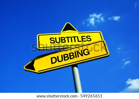 Subtitles vs Dubbing - Traffic sign with two options - watching subbed films and movies with original voices of actor vs dubbed version  Royalty-Free Stock Photo #549265651