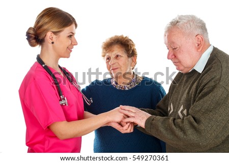 Picture of an old couple with their kind physician - isolated background