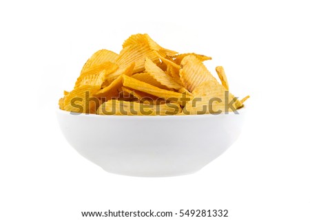 full bowl of crisp chips on a white background Royalty-Free Stock Photo #549281332