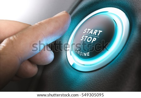 Car start stop system with finger pressing the button, horizontal image Royalty-Free Stock Photo #549305095