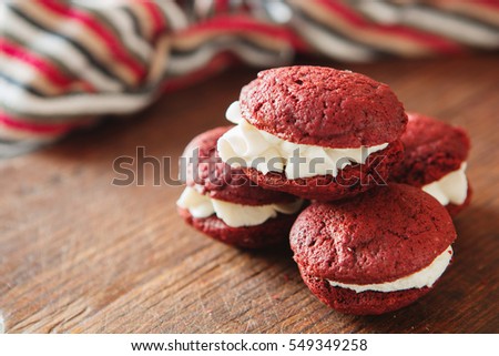 Close up of hocolate whoopie pies with vanilla cream, copy-space