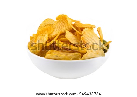 Tasty big chunks of potato crisps in a bowl on a white background Royalty-Free Stock Photo #549438784