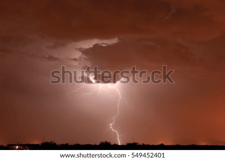 A bolt of lightning illuminating a late night dust storm in Arizona during the 2011 Monsoon season.