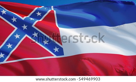 Mississippi (U.S. state) flag waving against clear blue sky, close up, isolated with clipping path mask alpha channel transparency, perfect for film, news, composition