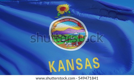 Kansas (U.S. state) flag waving against clear blue sky, close up, isolated with clipping path mask alpha channel transparency, perfect for film, news, composition