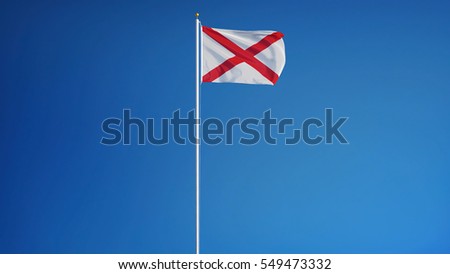 Alabama (U.S. state) flag waving against clear blue sky, long shot, isolated with clipping path mask alpha channel transparency, perfect for film, news, composition