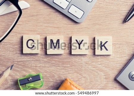 Word cmyk collected of game wooden cubes