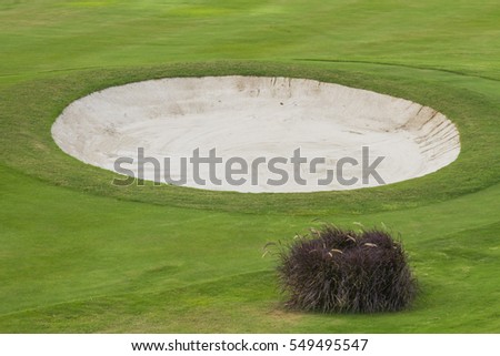 Sand bunker at the beautiful golf course.