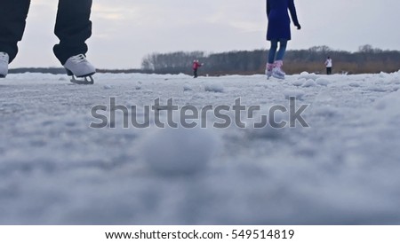 girl skating on ice, winter beautiful view, sport winter a holidays