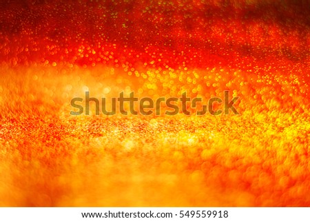 abstract defocused red and gold bokeh light background