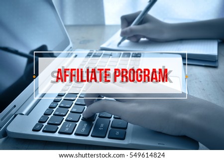 Hand Typing on keyboard with text AFFILIATE PROGRAM