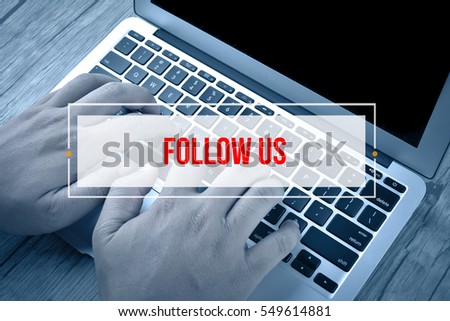 Hand Typing on keyboard with text FOLLOW US